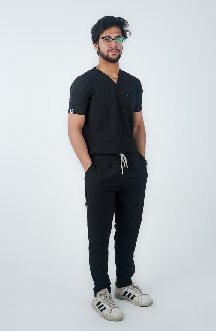 Side profile of male medical professional in Midnight Black Charm Scrub – ScrubyHub