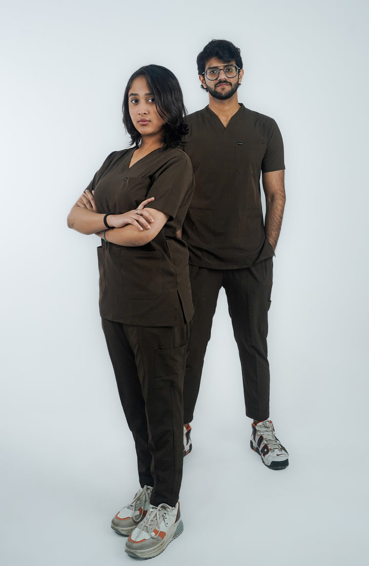 Male and female doctors in matching Midnight Brown Scrubs by ScrubyHub - front view