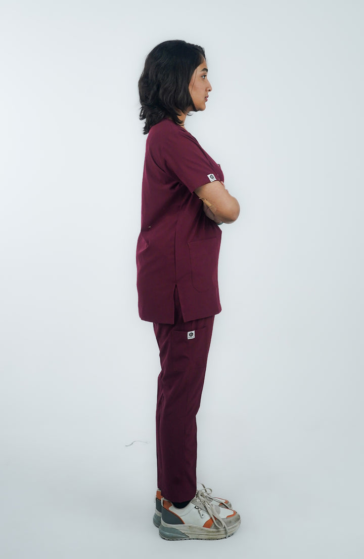 Fashion-forward side profile in ScrubyHub’s Midnight Maroon Elegance Scrubs.