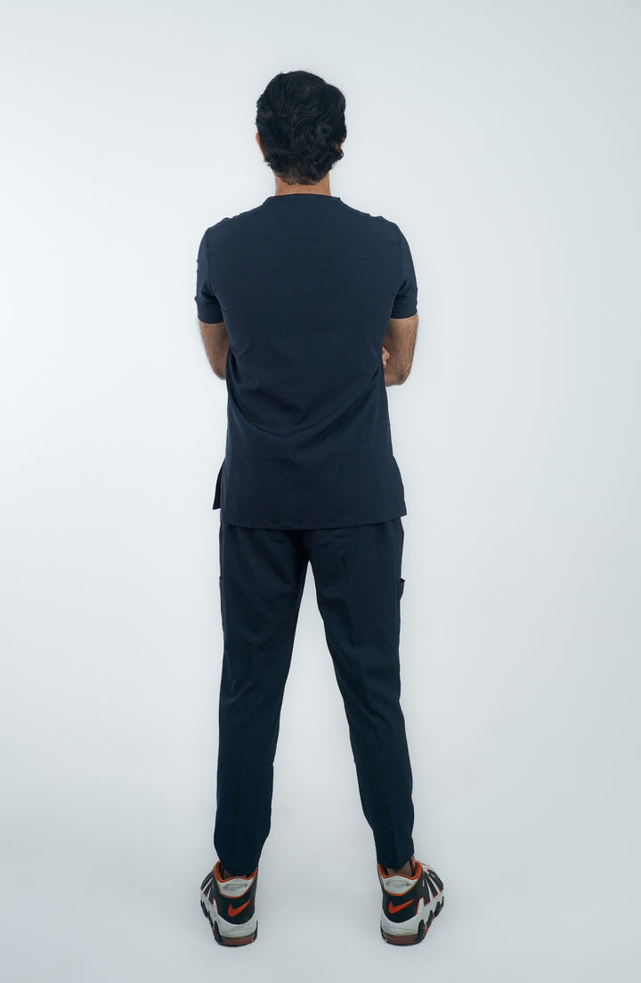 Back view of male medical professional in Midnight Ocean Wave Scrubs – ScrubyHub.