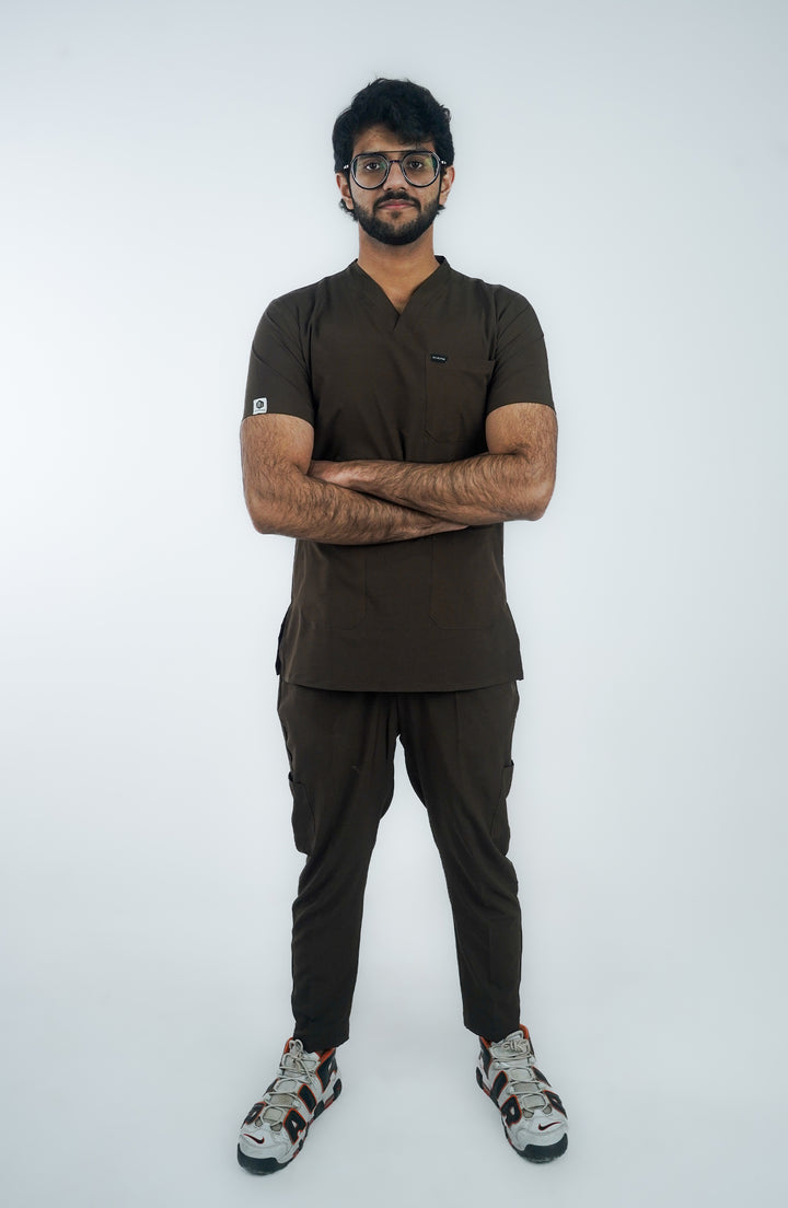 Front view of male wearing Midnight Brown Scrubs by ScrubyHub