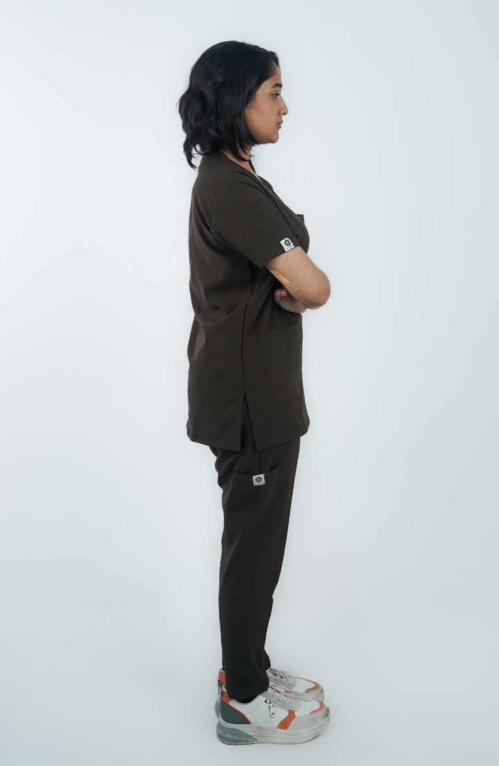 Side profile of female in professional Midnight Brown Scrub set