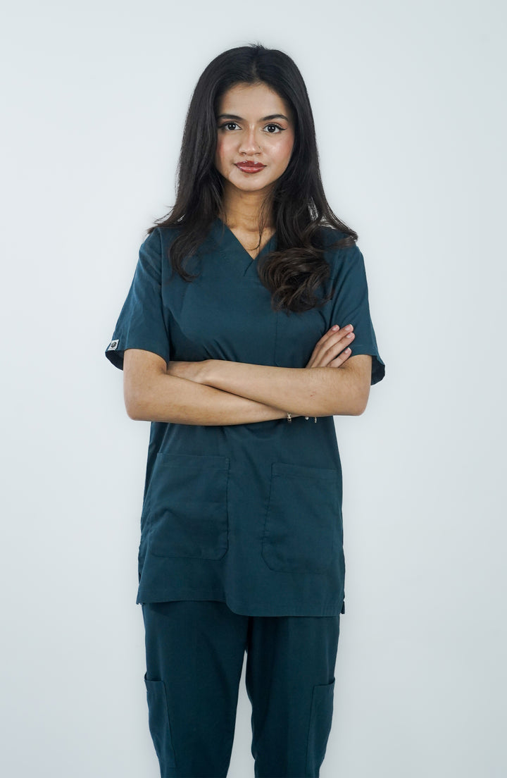 Female nurse in Zinc Cotton Scrub front view – soft, breathable fabric by ScrubyHub.