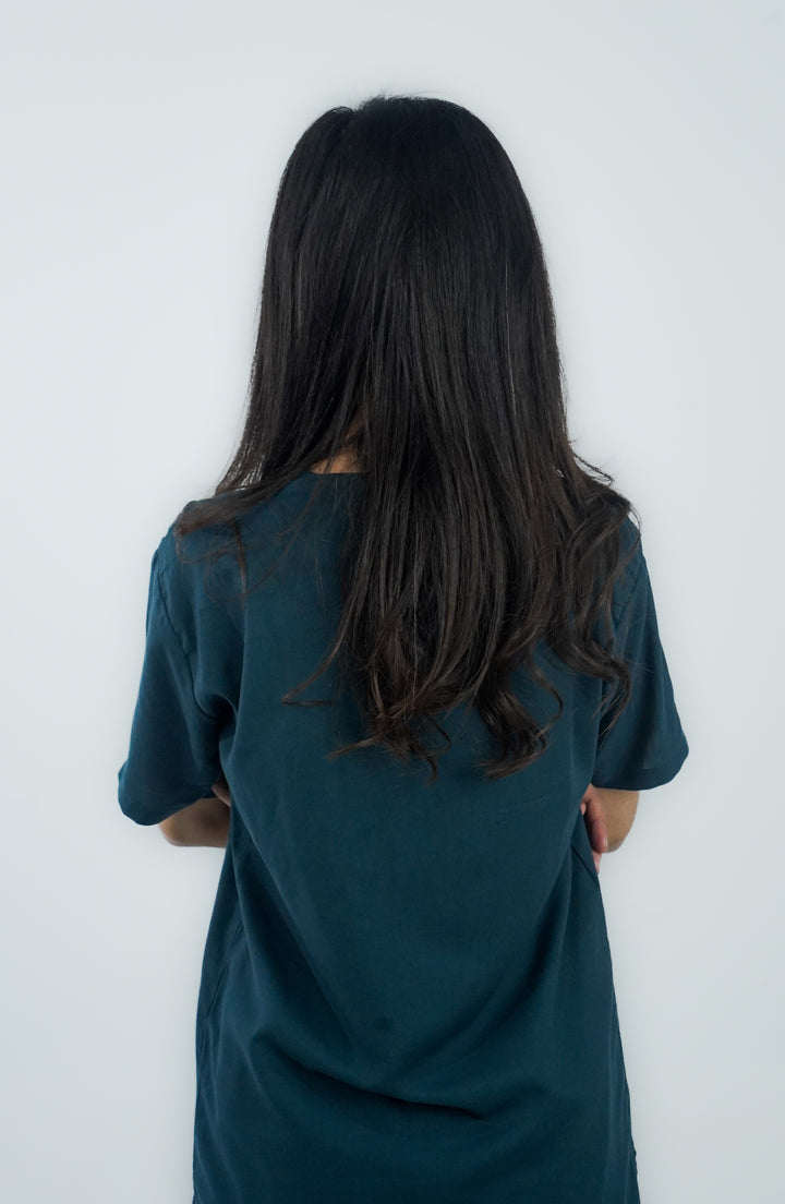 Back view of nurse in ScrubyHub Zinc Cotton Scrub – comfortable and stylish fit.
