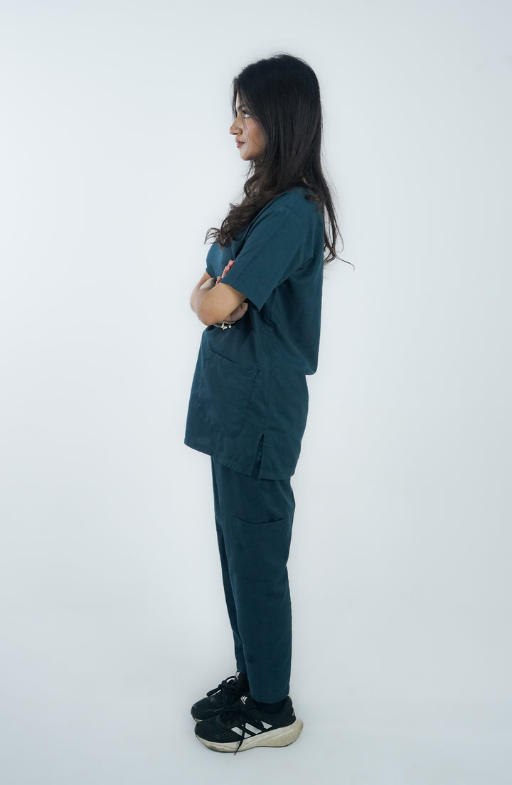 Side profile of female healthcare professional in Zinc Cotton Scrub by ScrubyHub.