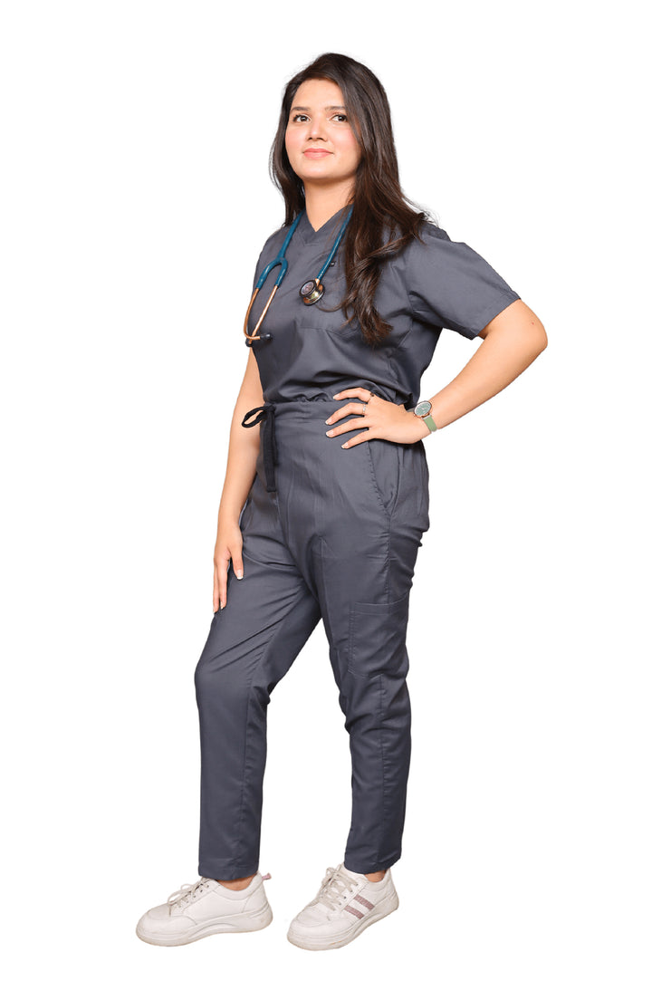 Female doctor wearing ScrubyHub’s grey cotton scrub with stethoscope in hospital hallway