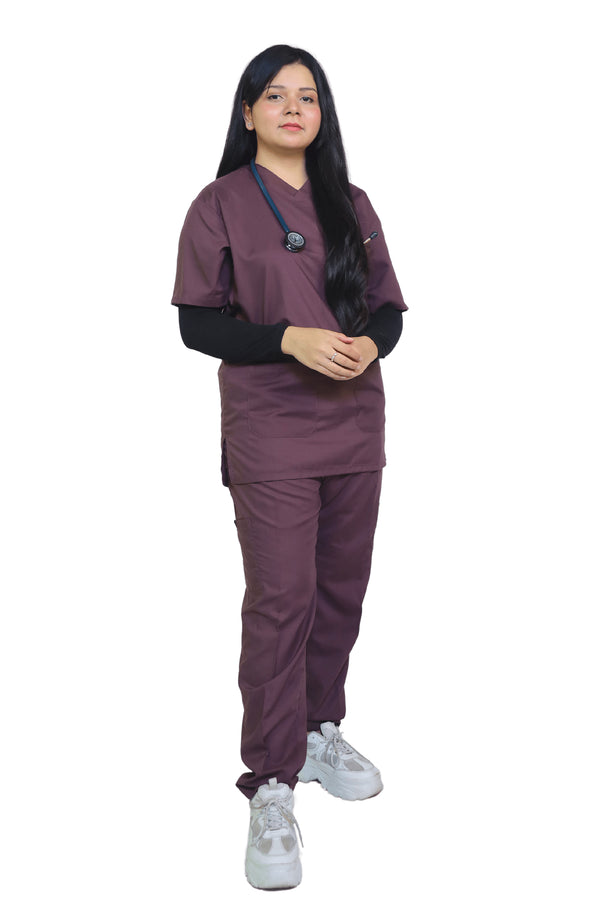 Female healthcare worker in Plum Cotton Scrub with stethoscope – ScrubyHub hospital wear