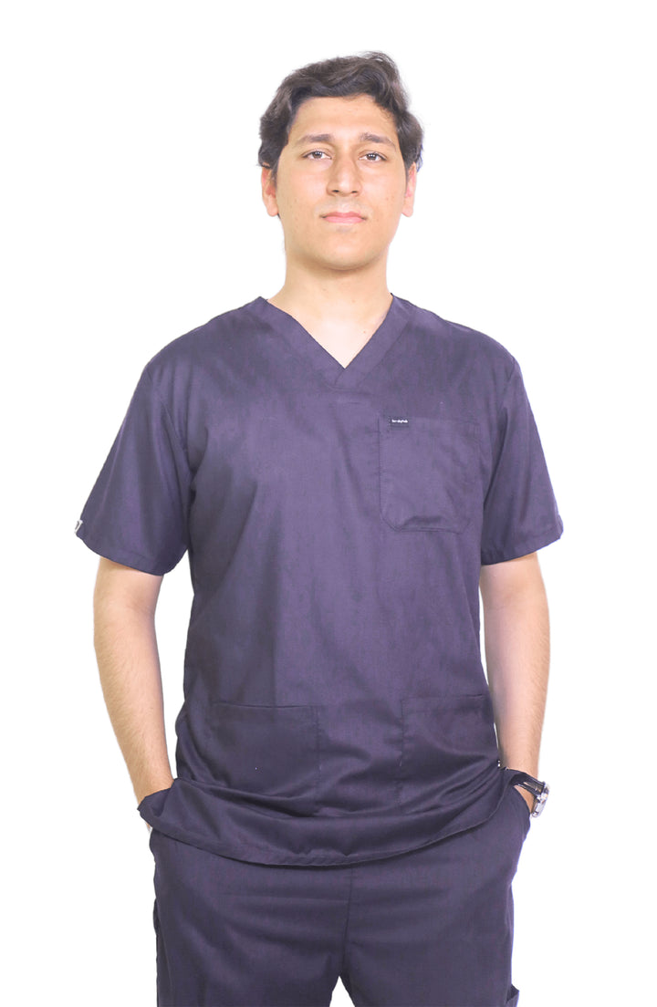 Male doctor wearing ScrubyHub purple cotton scrub standing confidently front-facing