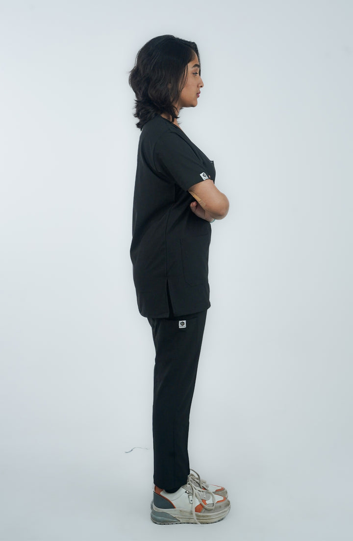 Female medical staff in Midnight Black Charm Scrub with stethoscope – ScrubyHub