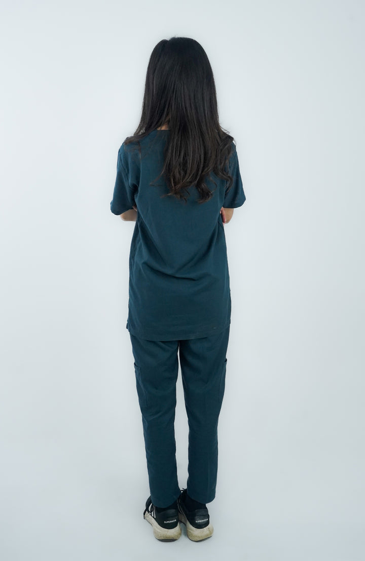Back view of woman in Zinc Cotton Scrub – perfect medical fit by ScrubyHub.